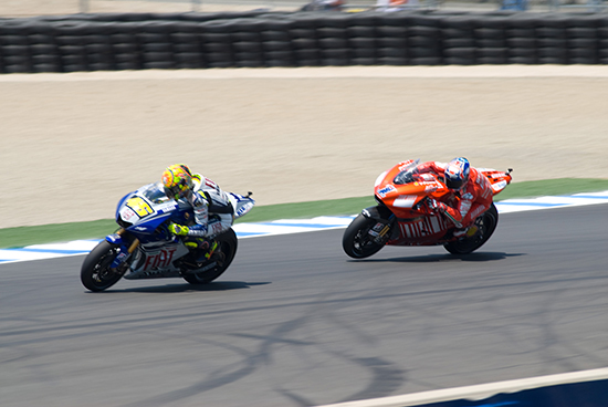 Valention Rossi leads Stoner at Laguna